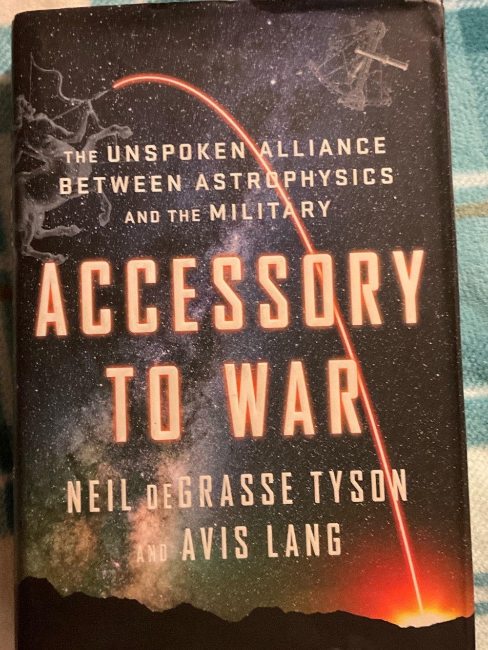 Neil deGrasse Tyson accessory to war astrophysics, military hardcover book